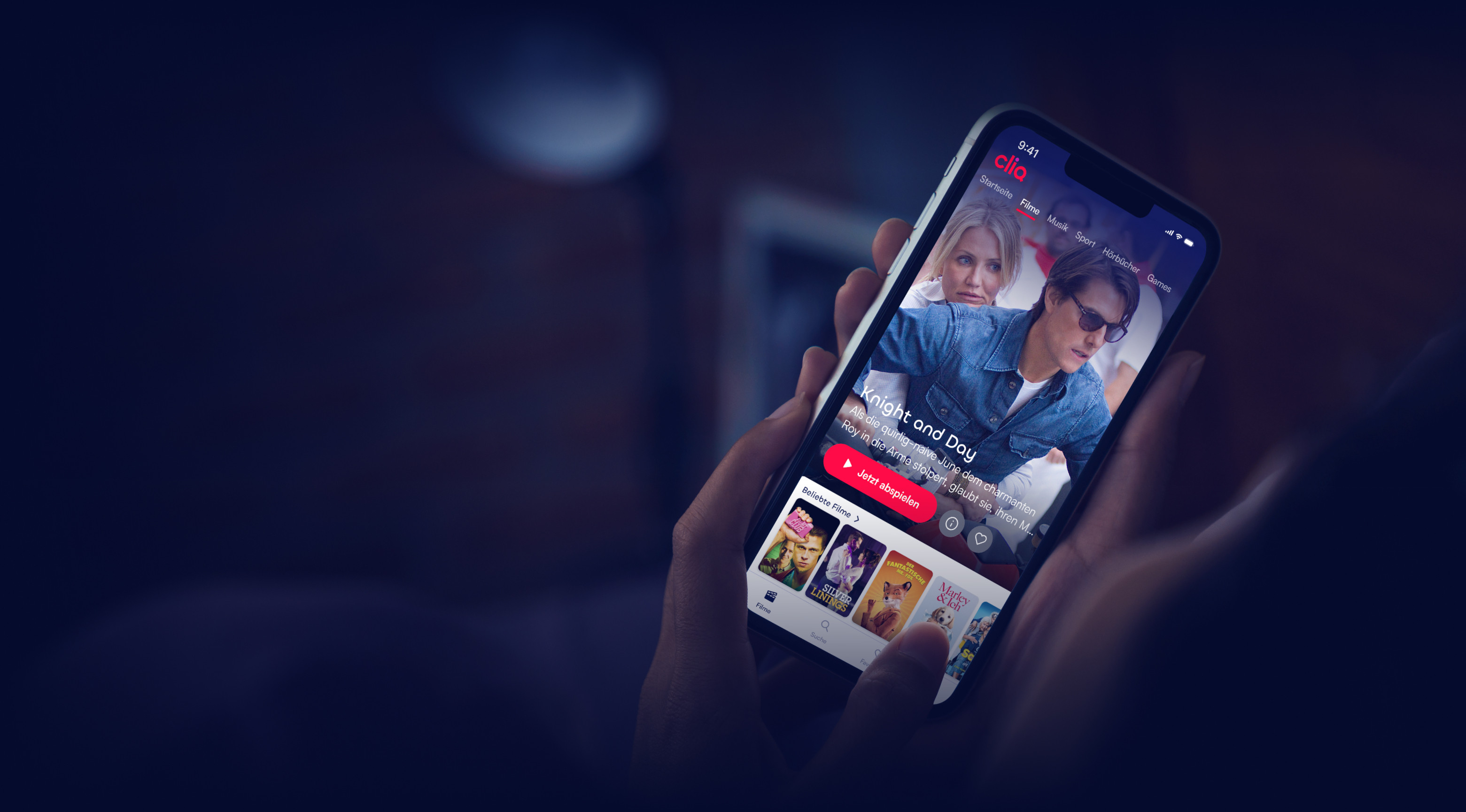 Close-up of hand interacting with the cliq.de app